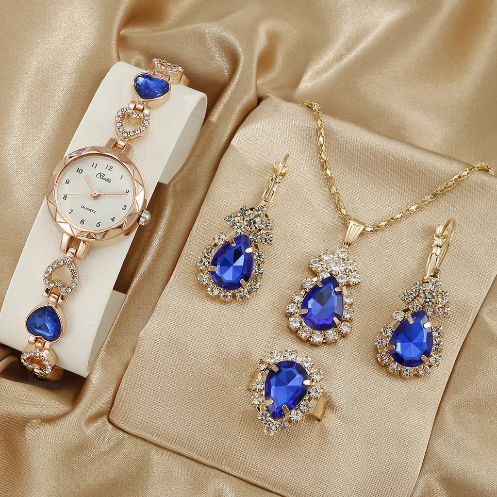 Women's simple disc quartz bracelet watch set with matching jewellery in pink, blue, purple options