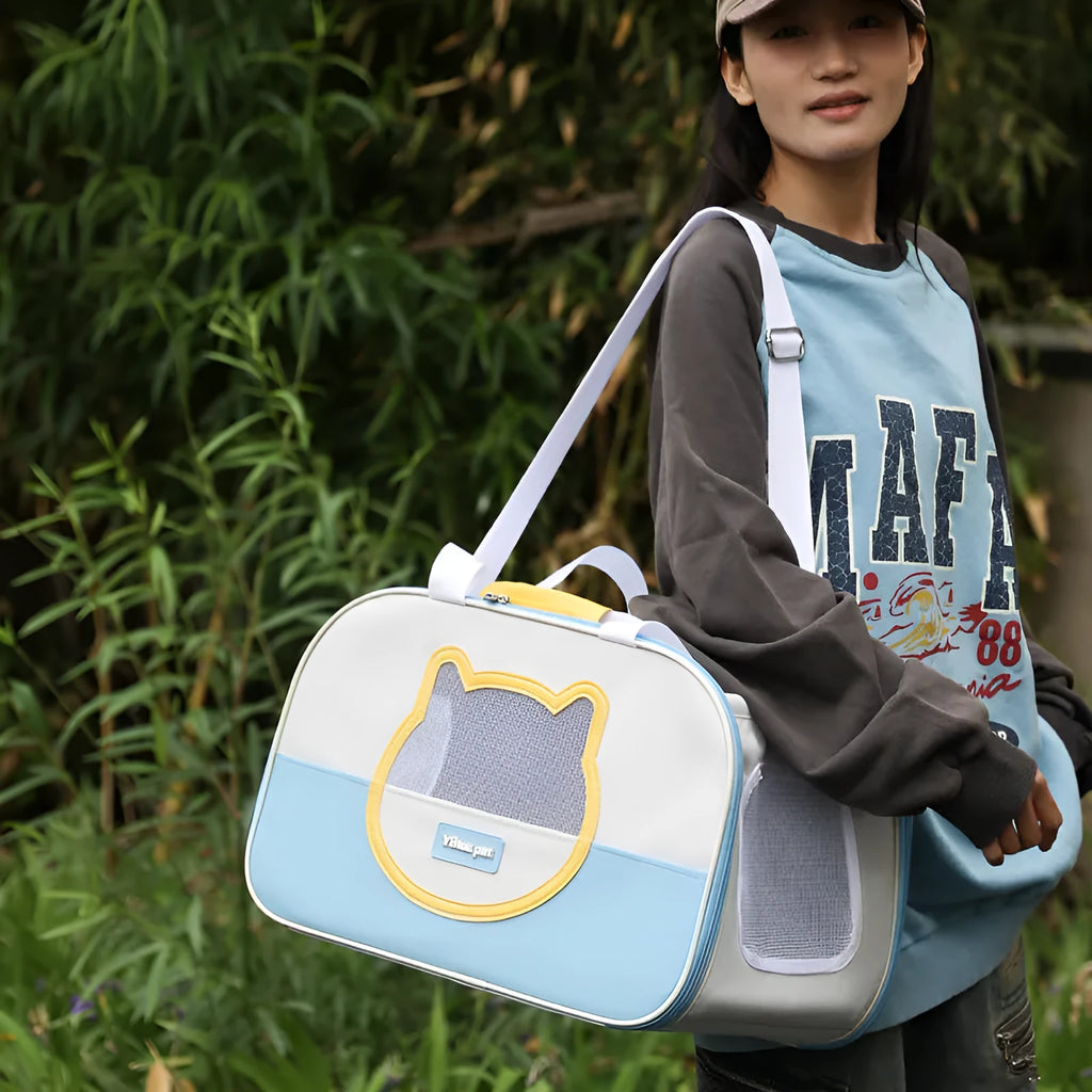Blue foldable Oxford cloth cat carrier backpack showing large capacity and shoulder straps.