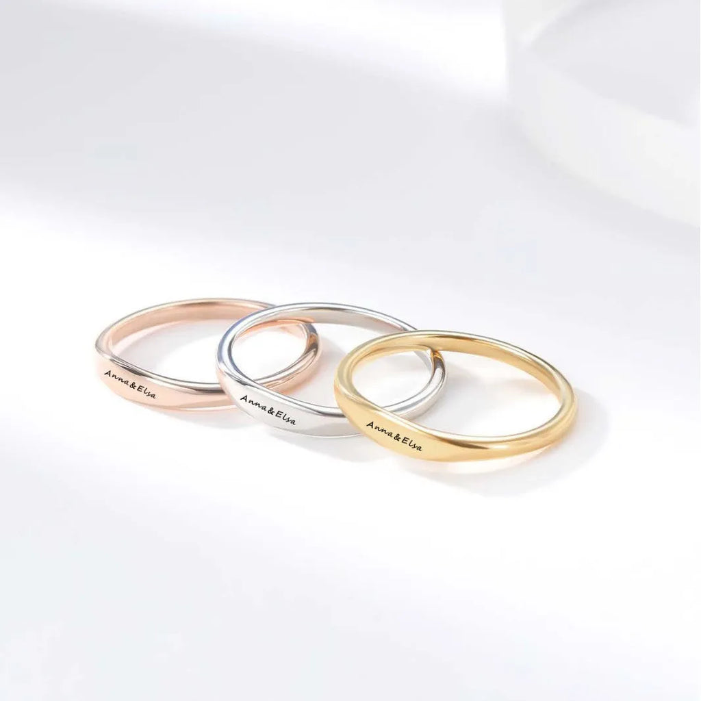Simple stainless steel couple rings in gold, rose gold, and steel colour, sizes 5 to 10, plain band design