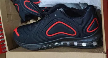 Men's black casual air cushion sneakers with lace-up front and thick sole.