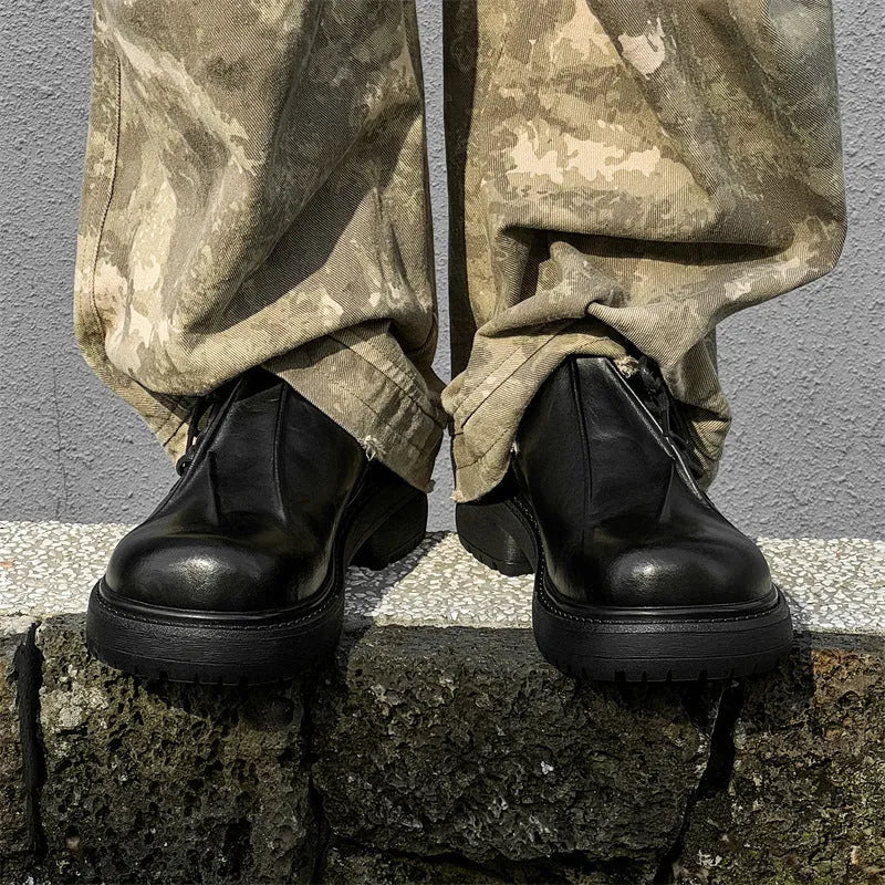Black platform leather shoes with warped head design and round toe cap