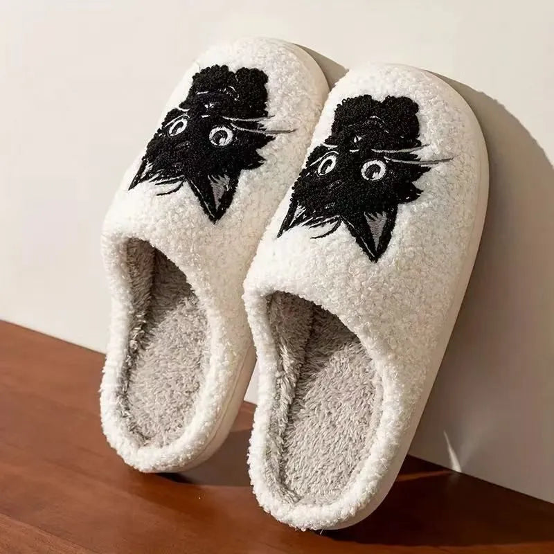 White plush slippers with Black Beard Cat cartoon couple design, showing thick construction and textured TPR sole.