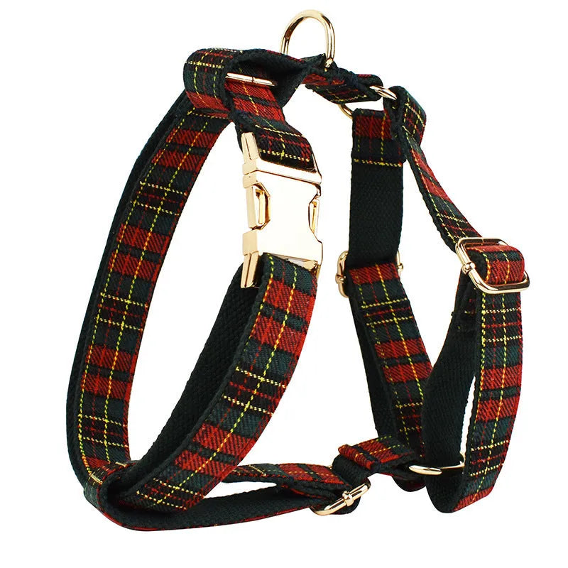 Christmas plaid green dog collar set with leash bow and vest on a festive background