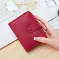 Women's lychee pattern organ short wallet in pu material with breathable antibacterial properties