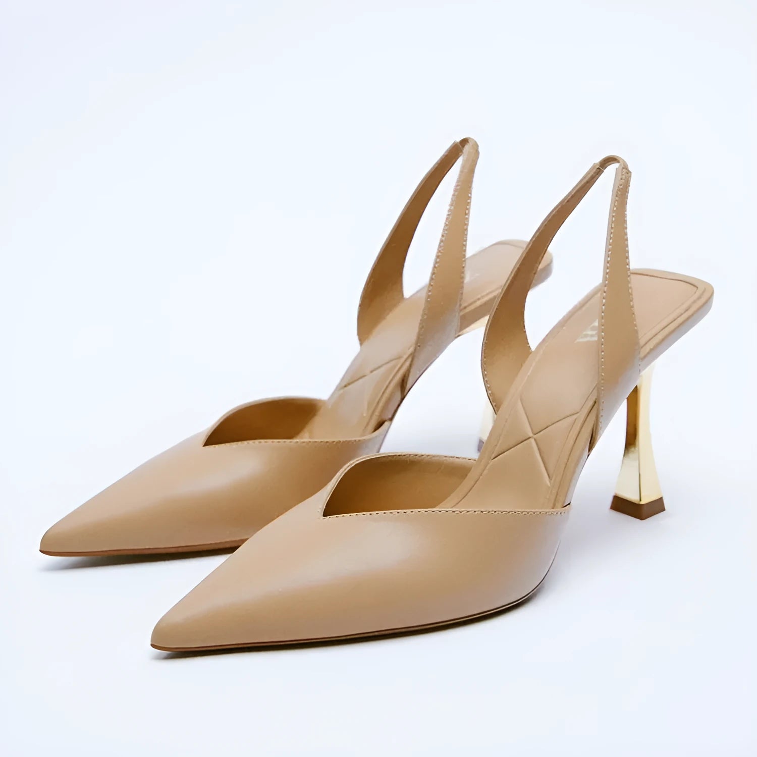 Women's patent leather pointed high heels in apricot nude and black with shallow-cut vamp