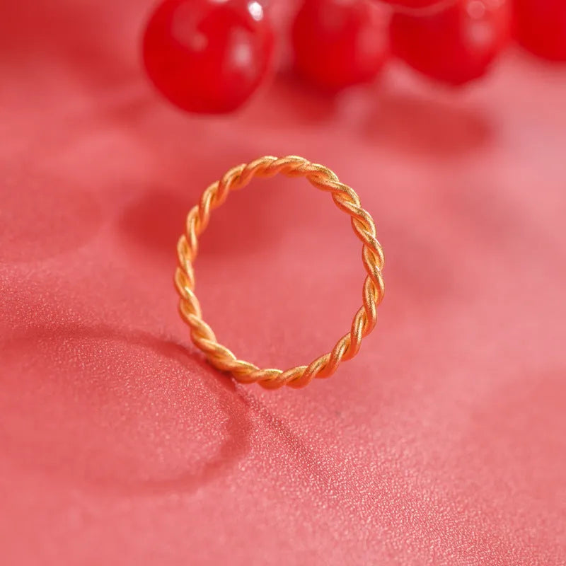 Brass gold plated women's ring in simple bracelet and twist styles, shown in UK sizes 6 to 9.