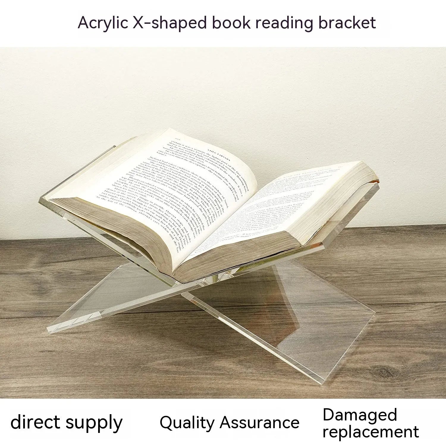 Clear acrylic X-shaped book reading rack displaying a book on a desktop