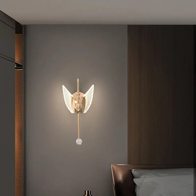 Modern minimalist gold swan wall lamp with acrylic shade showing tricolour LED light options for bedroom bedside use