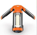 Retractable folding charging camping lantern in black and orange with bracket, measuring 58.2cm x 20cm x 9.4cm.