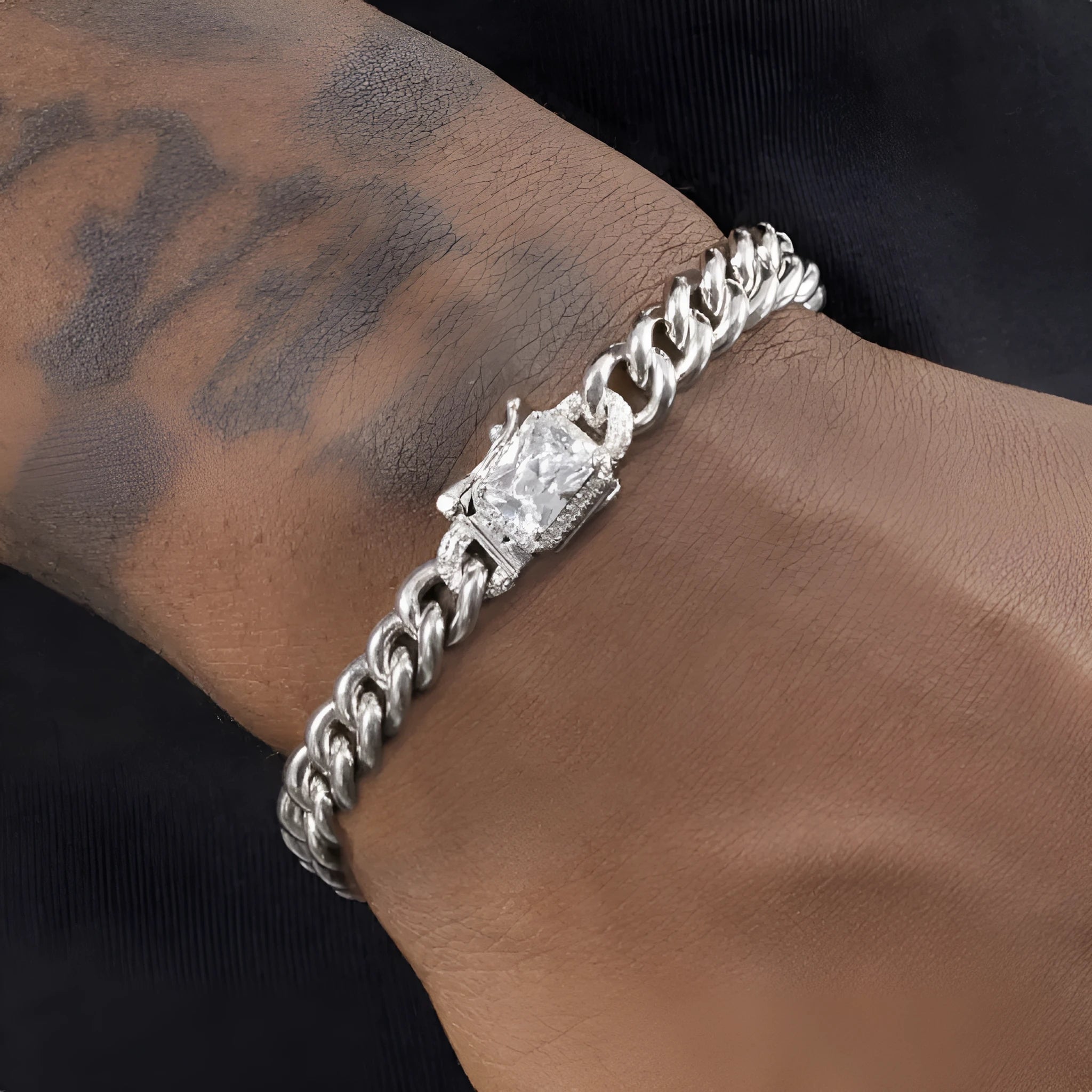 S925 sterling silver Cuban chain bracelet on flat surface showing link detail, 18cm unisex size