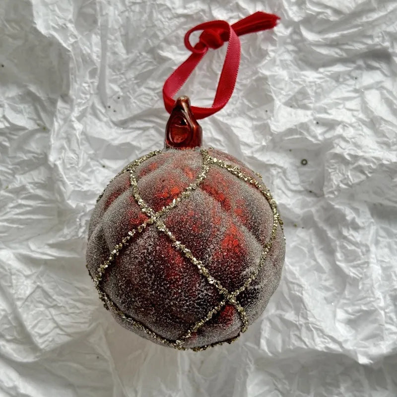 Handmade glass Christmas ball pendant 8cm in green colour hanging on tree branch