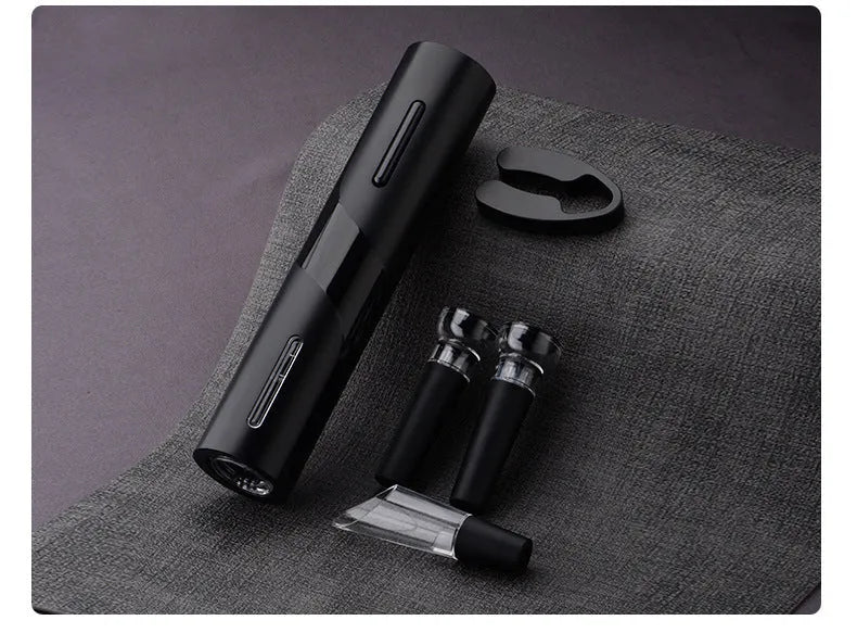 New Base five-in-one electric bottle opener set with black ABS decanter, vacuum stopper, foil knife, and storage base