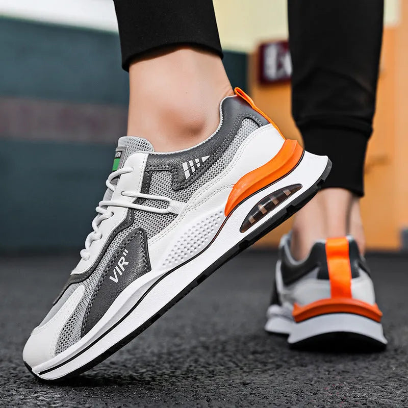Men's grey breathable mesh running shoes with a round toe and lightweight EVA sole.