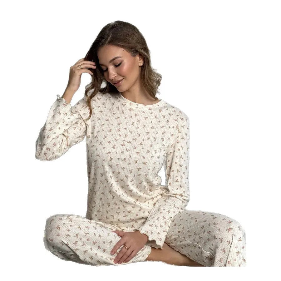 Women's white floral print lounge suit with bell sleeve top and wide-leg trousers