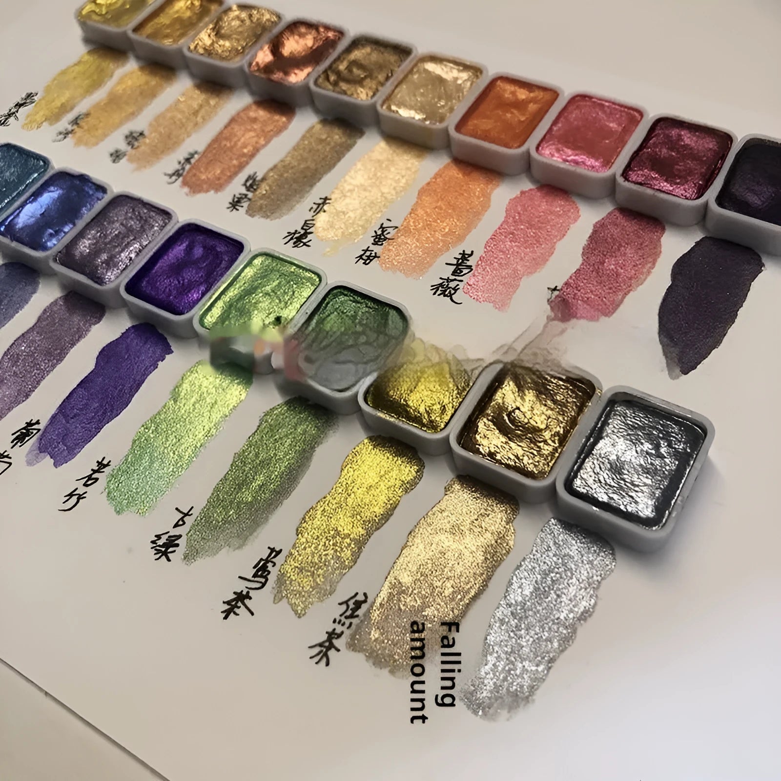 Traditional Chinese painting pearlescent watercolour set showing tubes of red, white, gold and assorted colours.