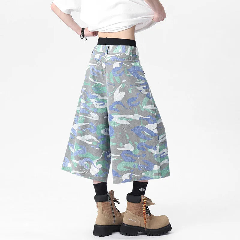 Camouflage denim work trousers with cargo pockets and straight leg cut