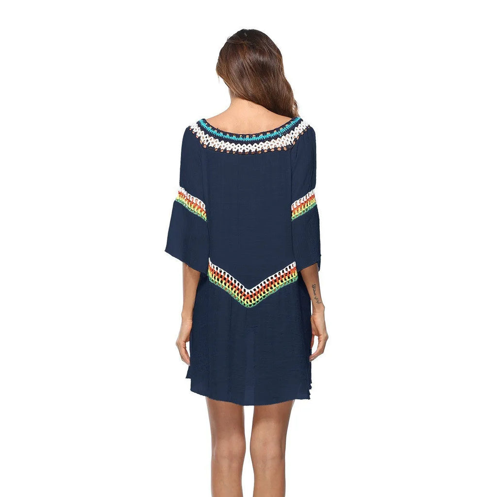 Women's crocheted ethnic style beach cover-up for sun protection, shown in apricot colour