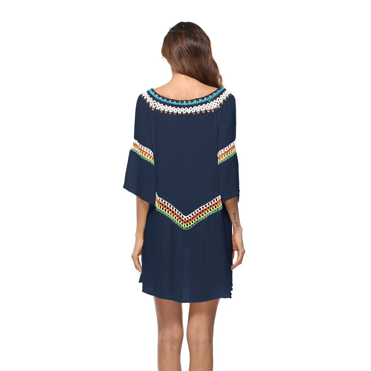 Women's crocheted ethnic style beach cover-up for sun protection, shown in apricot colour