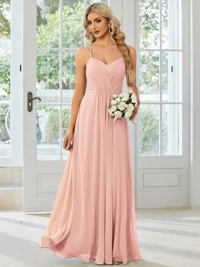 Women's long pleated A-line dress with sleeveless sling neckline in solid colours