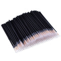 Pack of 100 black disposable eyeliner brushes with fine point tips and clear plastic protective sleeves.