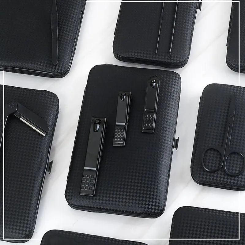 Black leather case containing stainless steel manicure tools with nail clippers and scissors