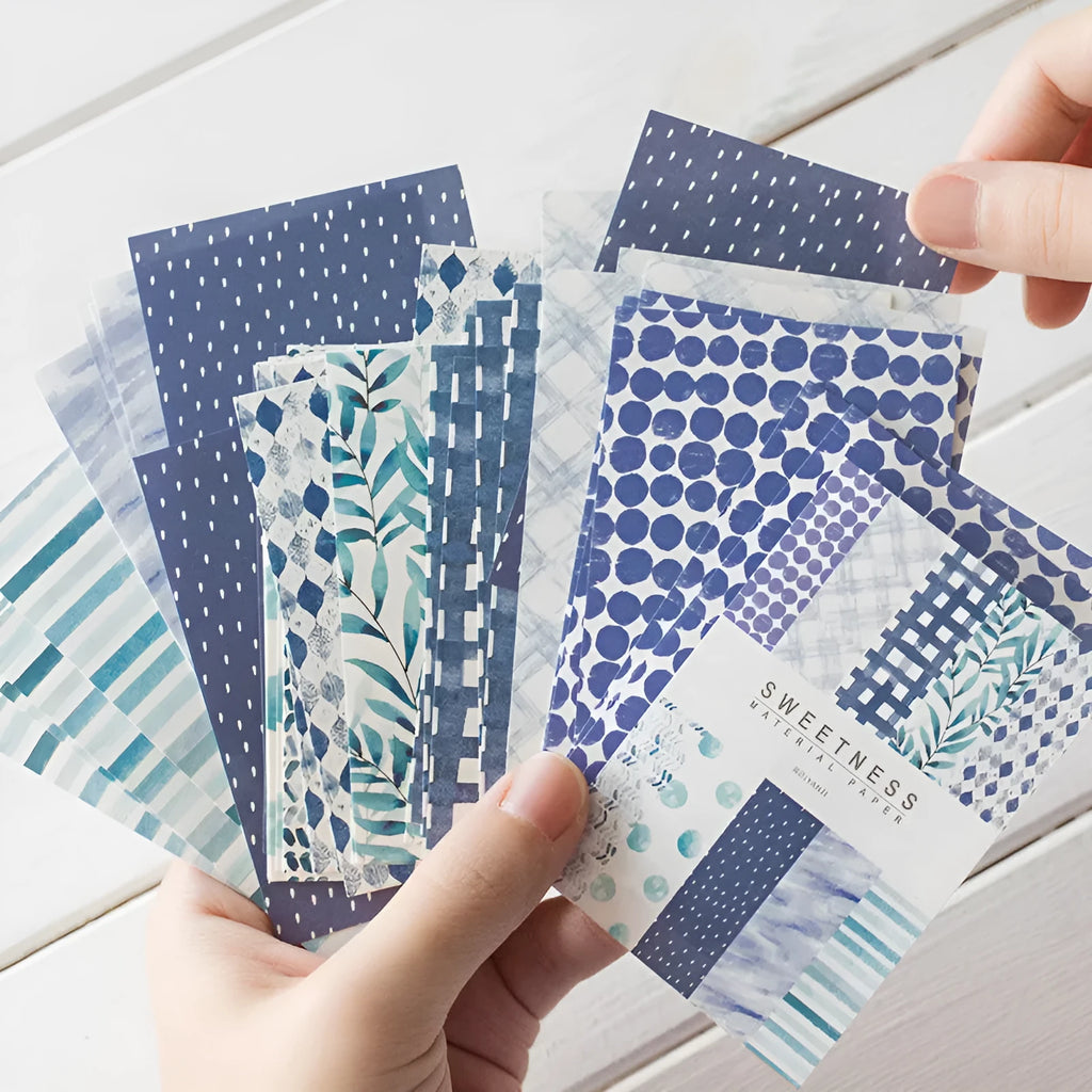Fifty sheets of retro collage note paper in dessert colours, each measuring 56 by 83 millimetres.