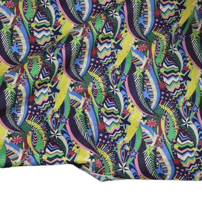 Blue floral digital print on 100% cotton fabric showing a 145cm wide by 1m long piece.