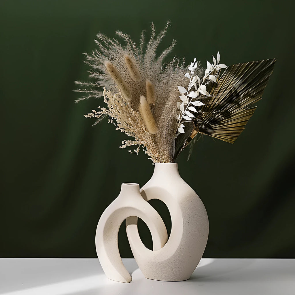 Two glazed ceramic vases in snuggle colour set for home decoration