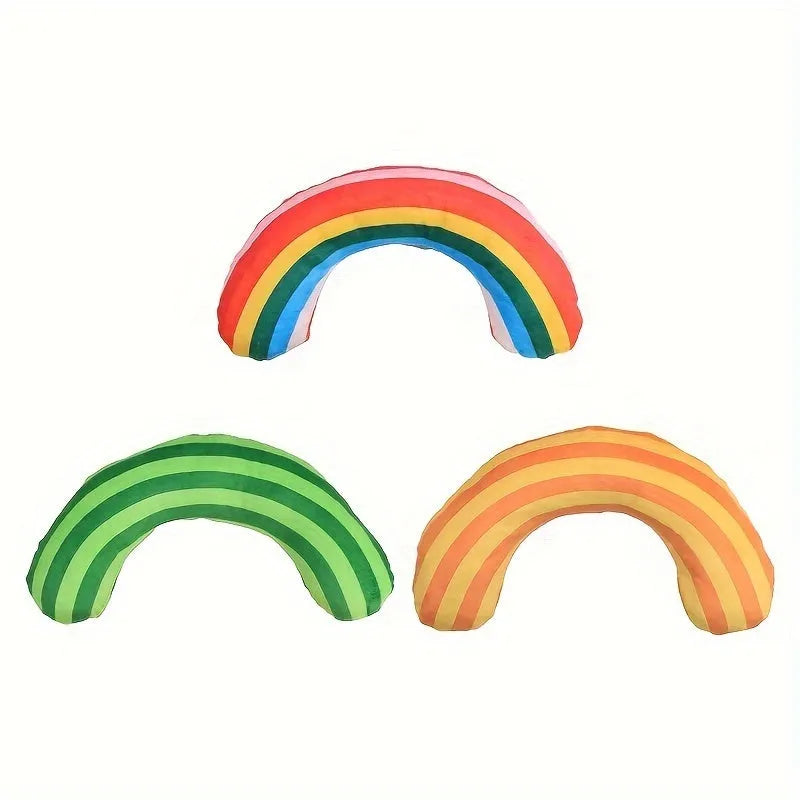 Set of cat toys including a noise maker with catnip and a green, rainbow, or yellow striped pillow.
