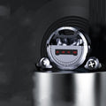 Red wireless Bluetooth in-ear earphones with a charging case on a table