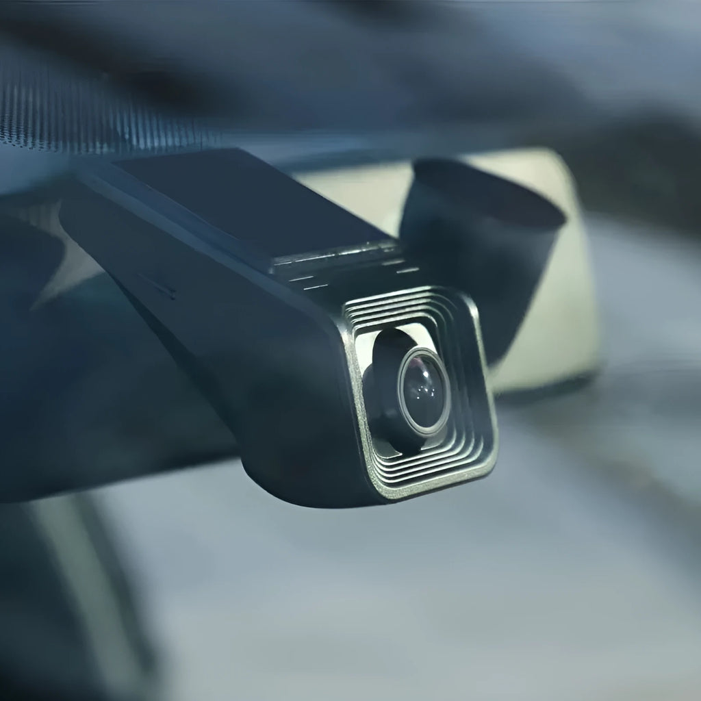 HD night vision car driving recorder dash camera on a windscreen.