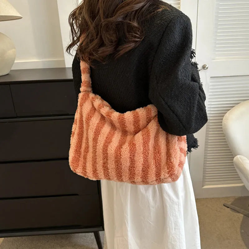 Large striped plush tote bag for women in black, green, orange, purple, or white, portable shoulder handbag.