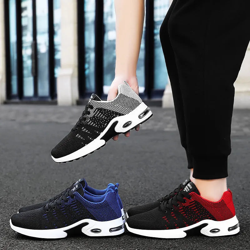 Men's Flyknit mesh low-top casual sneakers in black and grey colourway with lace-up front.