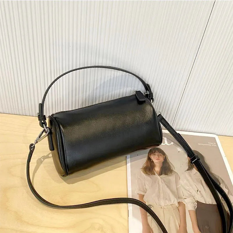 Soft vegetable tanning leather cylindrical crossbody phone bag in six colour options on a white background.