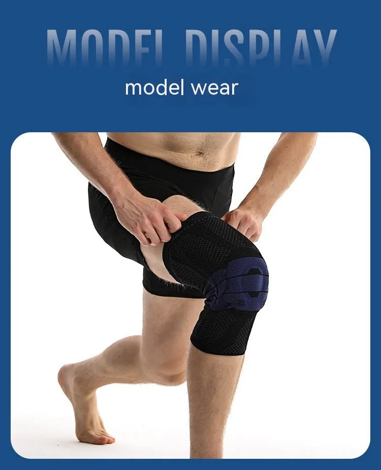 Adult black and blue sports knee pad made of nylon and spandex, shown on a knee.