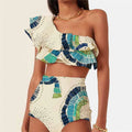 White women's one-shoulder bikini with a large double-layer lotus leaf detail and high thigh split.