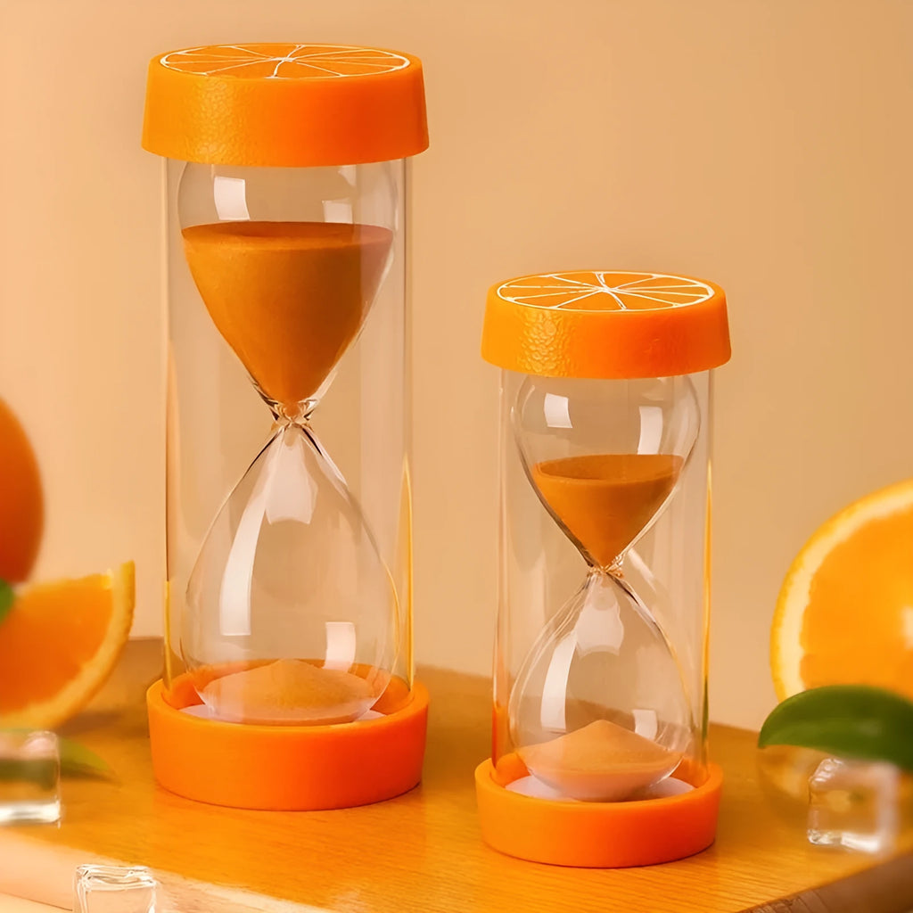 Plastic fruit-shaped hourglass timer in lemon colour on a desk – handmade Chinese style desktop ornament