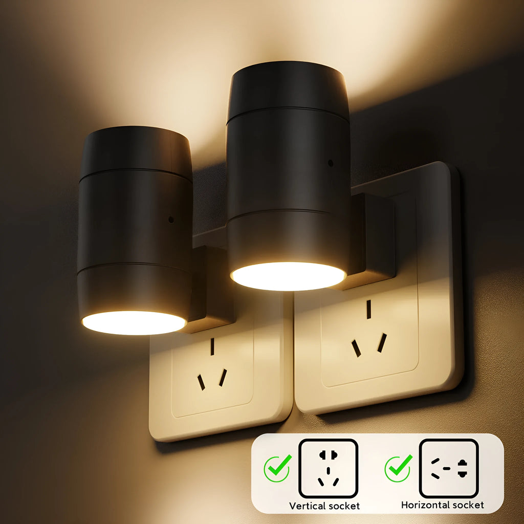 Small white plug-in night lamp with a rotatable head and adjustable brightness control on a grey background.
