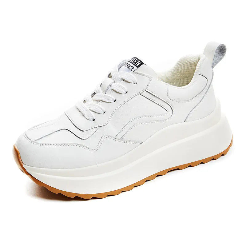 Women's beige cowhide leather casual sports shoes with round toe and cross-strap detail.