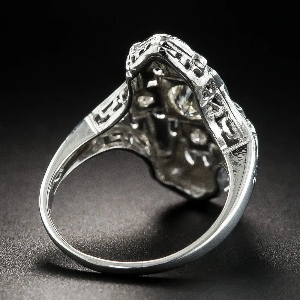 Geometric hollow out silver ring with diamond-studded details on copper construction