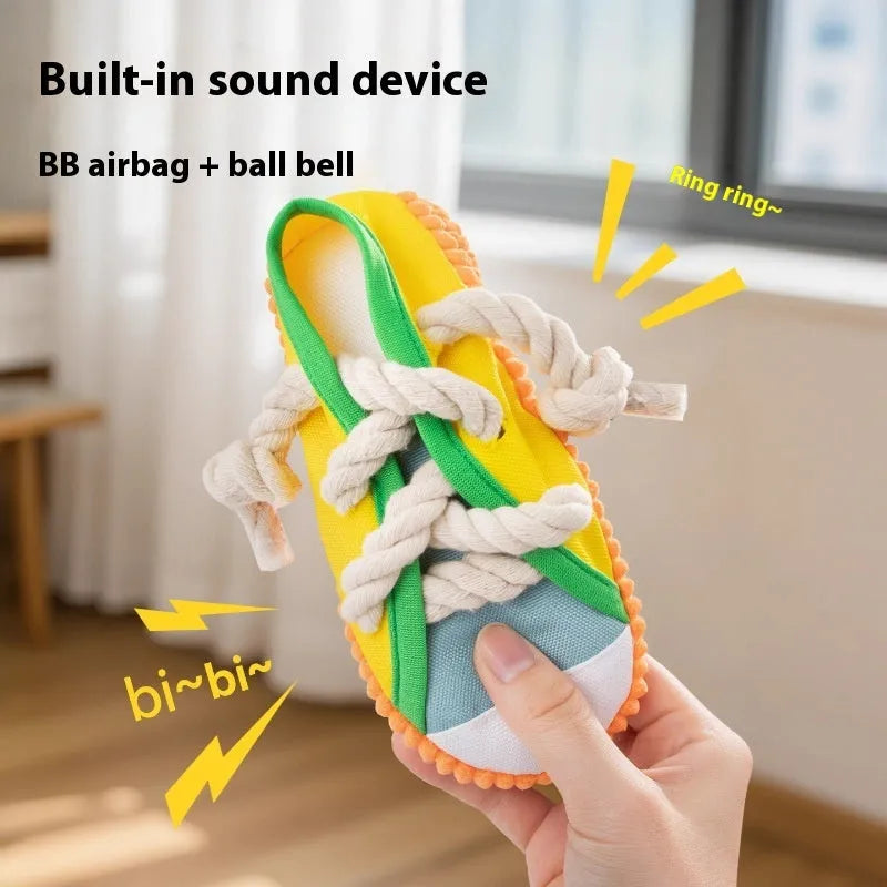 Plastic dog slippers toy with sound mechanism in yellow, black, or blue colours for chewing and interactive play