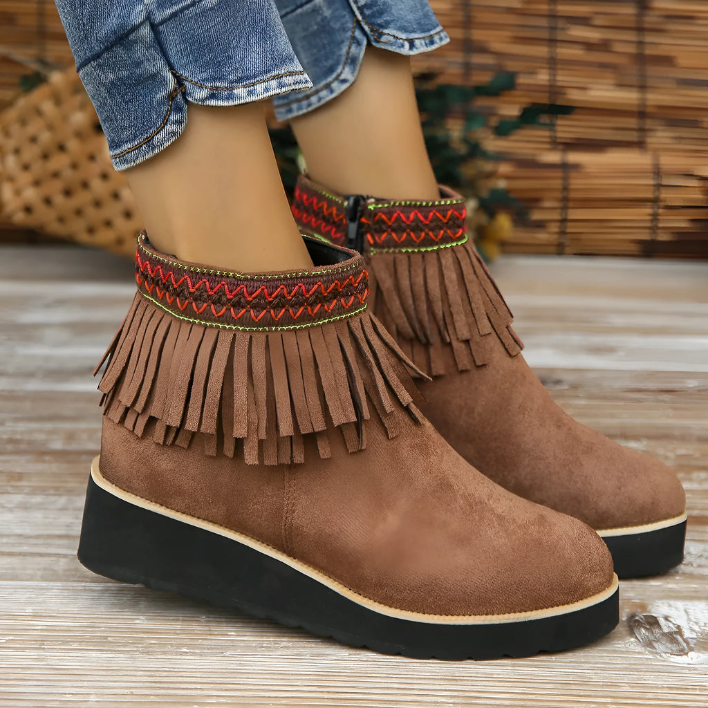 Women's suede wedge ankle boot with side zipper and tassel detail in black