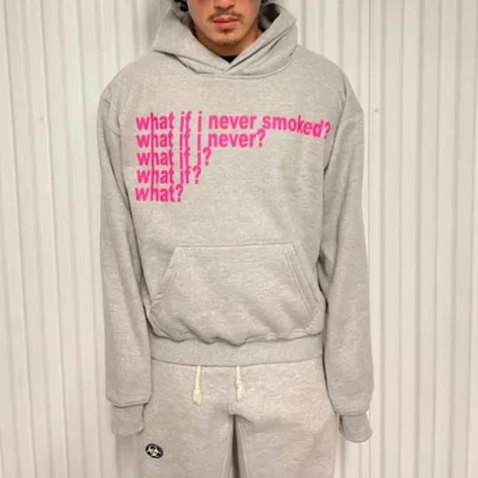 Black heavy hooded sweater with white letter and figure print on the front.