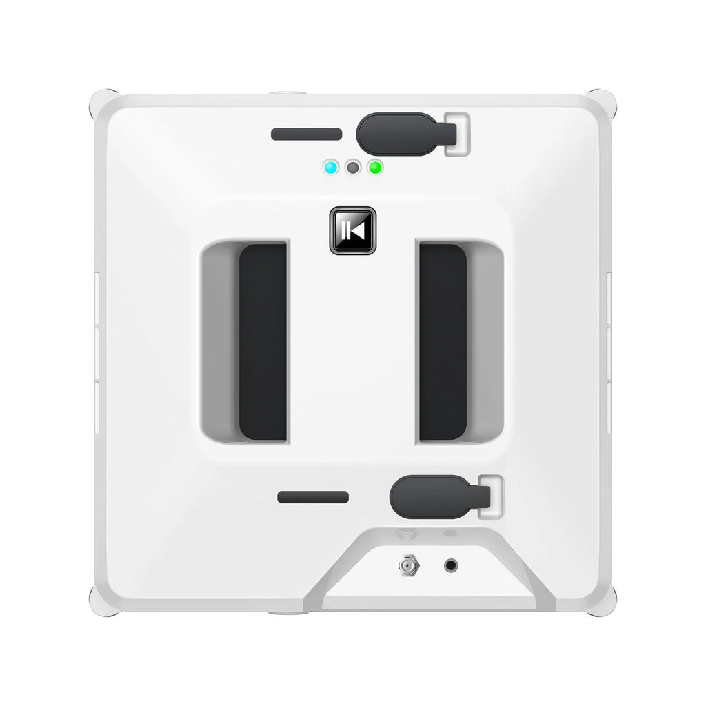 White intelligent small window cleaner robot on smooth indoor glass surface with plastic body