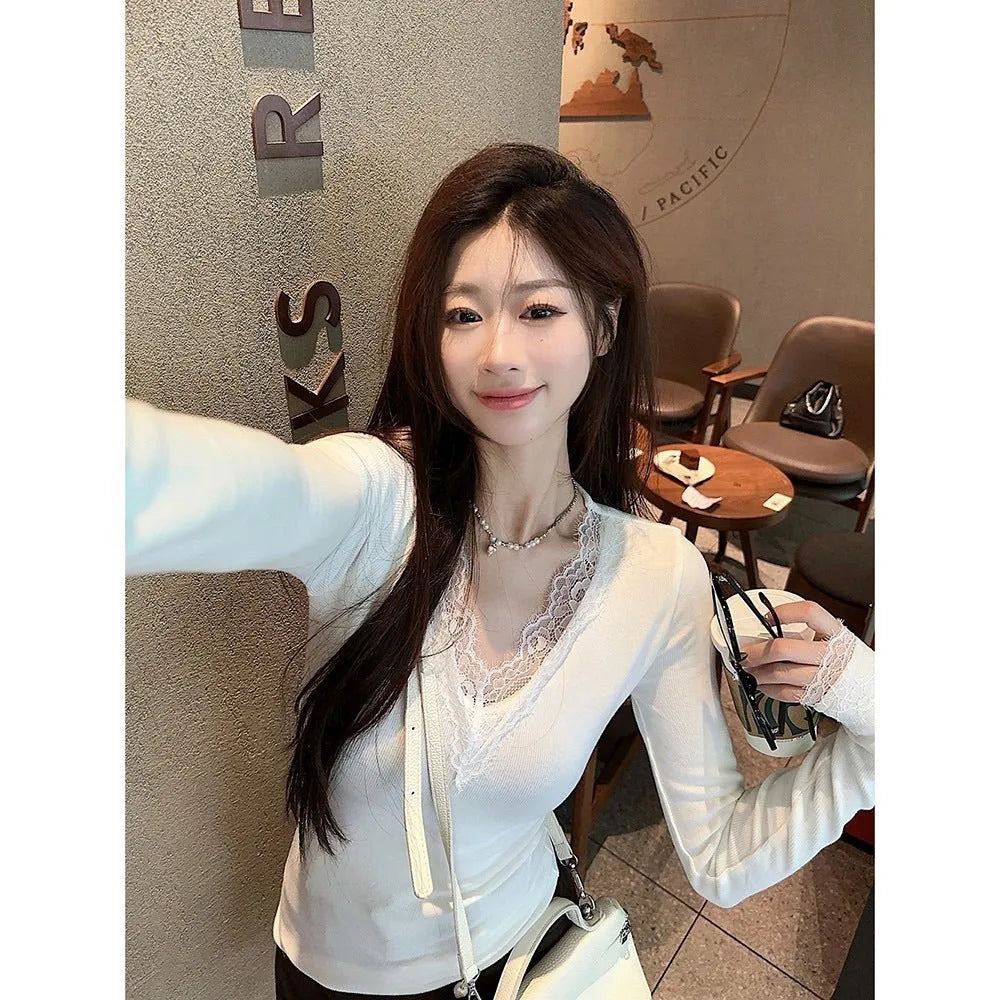 White V-neck long sleeve top with lace stitching and brushed finish, slim fit, sizes S-XL.