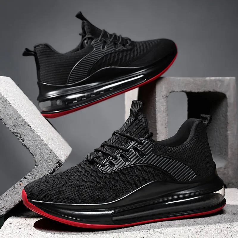 Men's black mesh running shoes with low top, round toe, and lace-up design on rubber sole