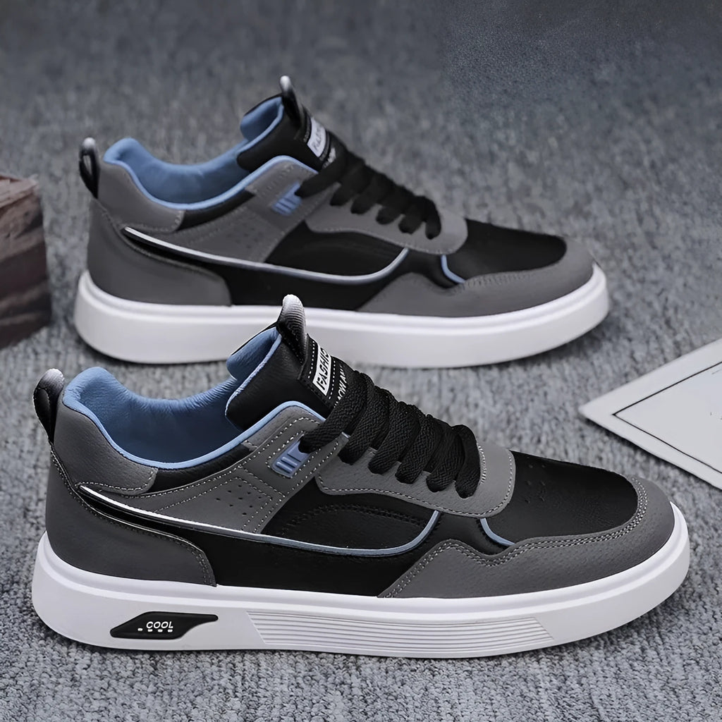 Men's low-top canvas board shoes in black, beige, or grey with leather stitching details.