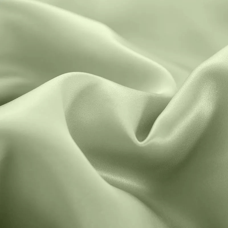 Solid colour silk duvet cover in plain weave construction, shown in bright brown