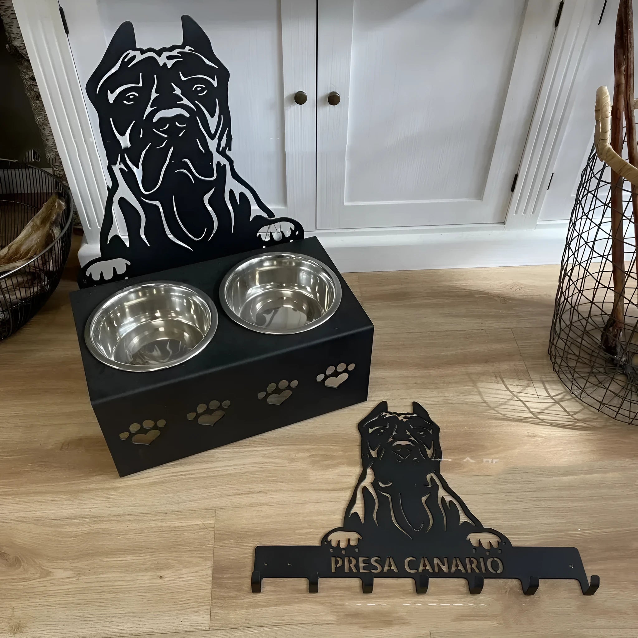 Personalised dog bowl holder with stainless steel bowl on iron stand showing custom name engraving