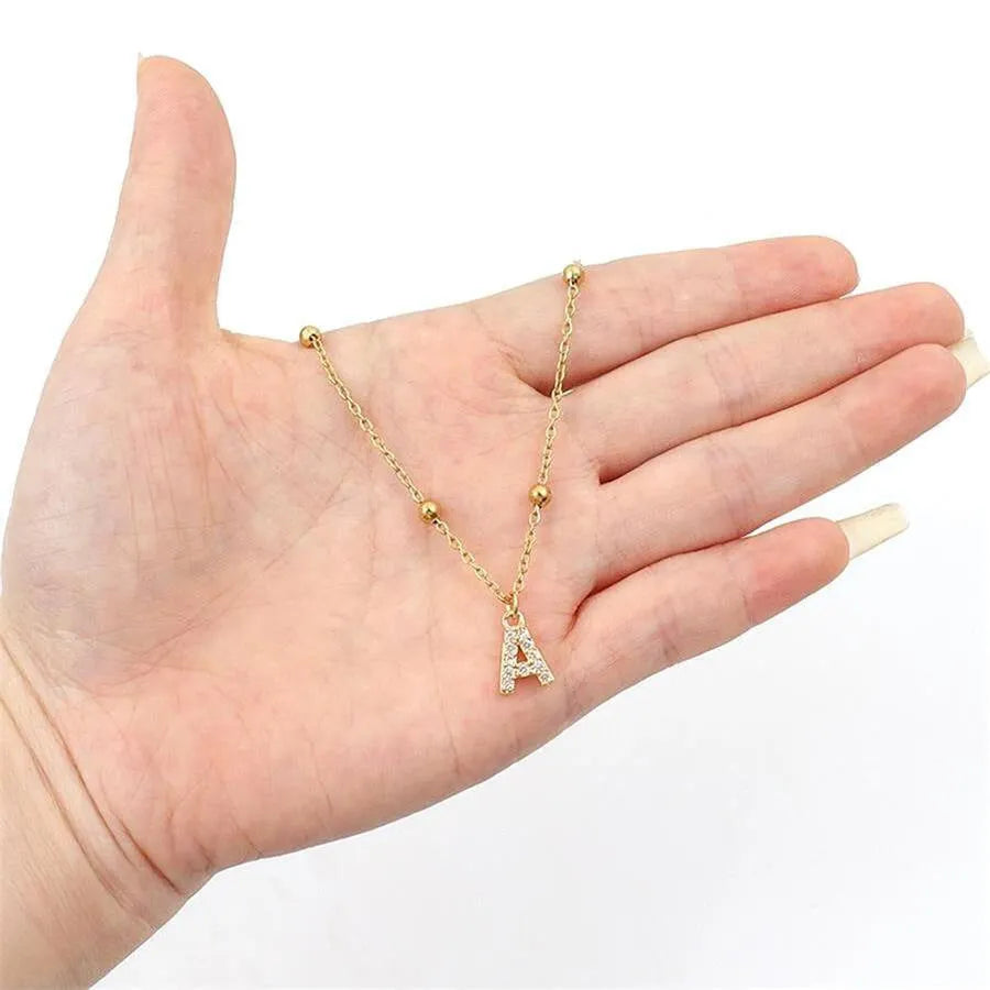 Light luxury copper pendant necklace with micro zircon inlaid letter, unisex O-ring chain, electroplated finish, style options A-Z